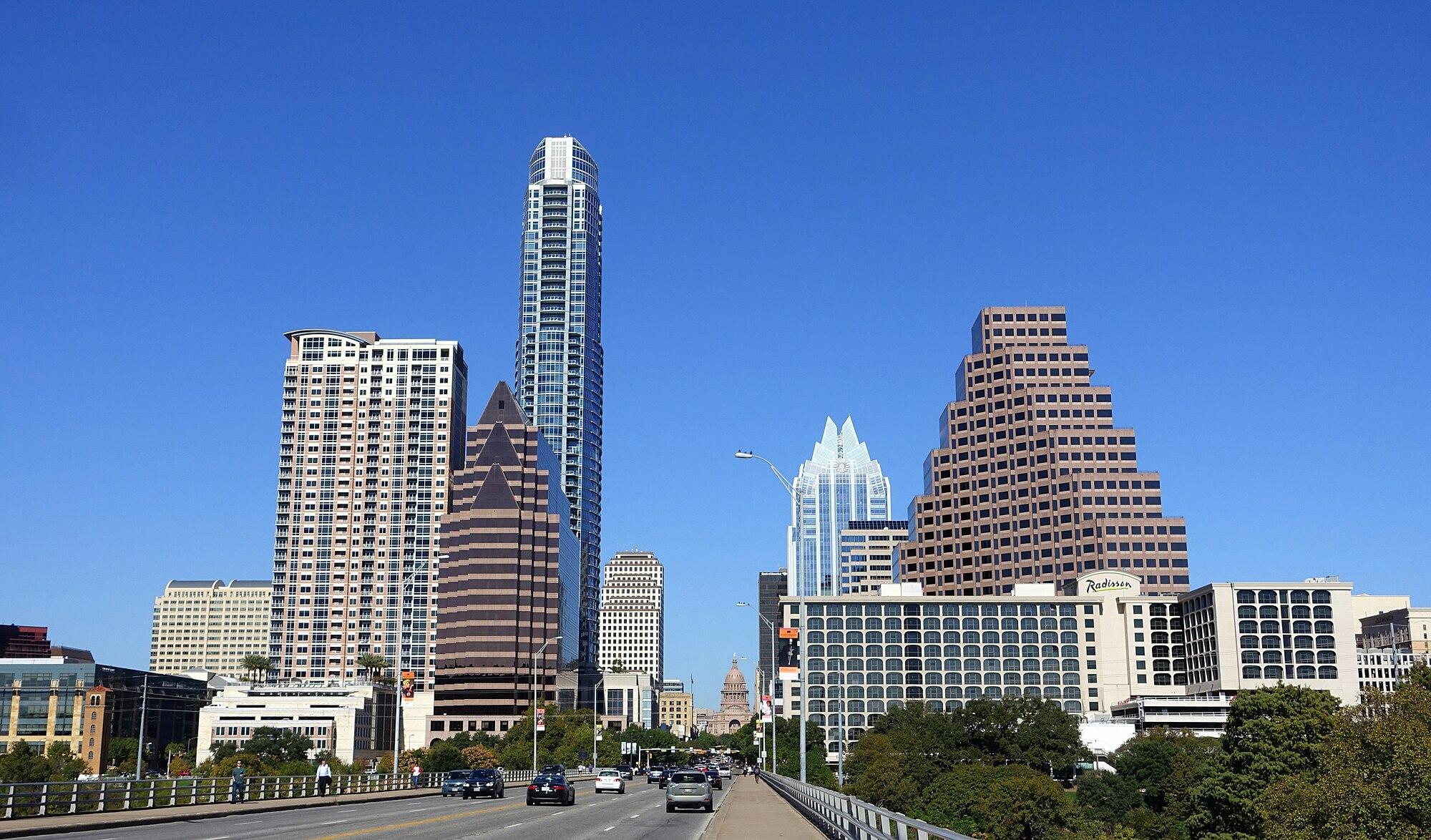 Street view of several skyscrapers in Austin.